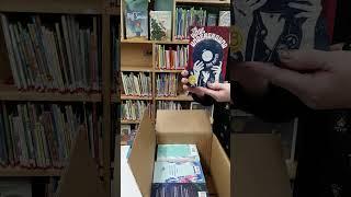 Kellogg Public Library 12/13/2021 Unboxing JLG books Box 1