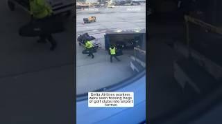 Delta Airlines workers seen tossing golf clubs into airport tarmac