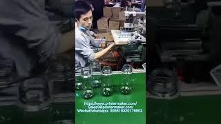 scale printing on sport bottles with silkscreen printing machine model EASY-300E
