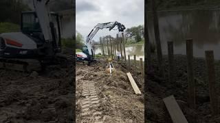 E85 Bobcat Driving Piles #bulkhead #piledriver #iworkuwatch