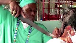 Cuban 'healer' performs surgeries with a machete