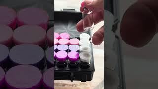 Store in style with this 20-vial case, featuring elegant floral-themed caps.