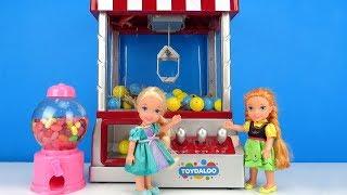 Claw Machine ! Elsa and Anna toddlers win prizes - Arcade game room