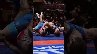 Magomed RAMAZANOV  picks up a fall