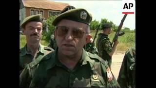 KOSOVO: SERB TROOPS BEGIN WITHDRAWING