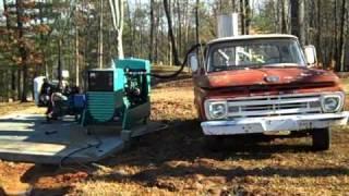 The wood gas generator runs the whole farm!