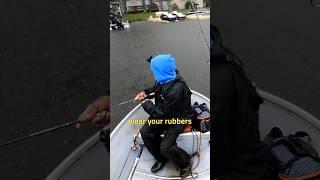 Reel Dedication! Pops Catches Winning Fish in Pouring Rain