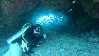 Woman Scuba Diver Exploring Cave