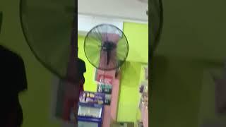 26" Deton industrial wall fan at grocery