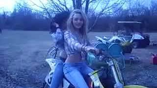 2 GIRLS IN UGGS REVVING A DIRT BIKE. (REVVING A MOTORCYCLE IN UGG BOOTS)!!!