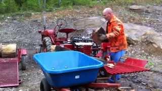 TW-5 log splitter taking on an Oak