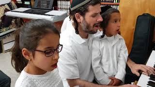 "Mah Ashiv la-HaShem" (from Hallel)