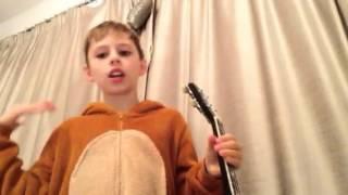 Funny kid plays ukulele!!!!!!! LOL!! 