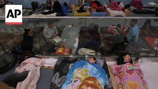 Fearful of Iran missiles, hundreds sleep in underground train stations in Israel