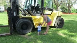 Capri on a TRACTOR (with a verrry large pregnant lady)