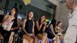 Thailand Bangkok nightlife street scenes. Thaniya, Patpong ladies look around!