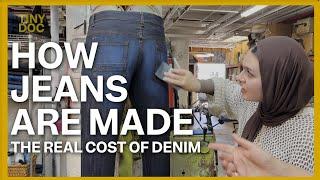 A pair of jeans costs way more than you think