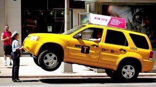 Watch a Parking Meter Attendant Lift a Taxi in Epic Prank!