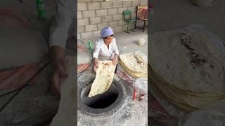 Armenian traditional bread Lavash baking by experienced women