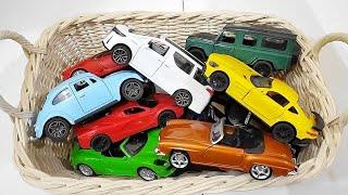 Box Full of Model Cars -Mazda Mx5, Koenigesgg Jesko, Lamborghini Scv12, Byd Yang Wang U8, Toyota Car