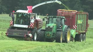 Rostselmash RSM F 2650 + John Deere 6170R + Strautmann forage wagon on grassland demo in Germany