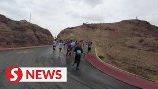 At least 21 marathon participants die due to extreme weather in China