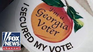 'DOWN IN FLAMES': Georgia election official praises court for striking down ballot counting measure