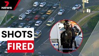 Man critical after being shot by police at Elderslie caravan park | 7NEWS