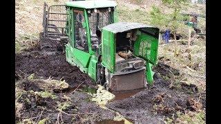 John Deere 1110E stuck deep in mud, saving with homemade forwarder