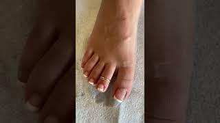 Foot with Gold Toe Rings by Fancy Feet Co.