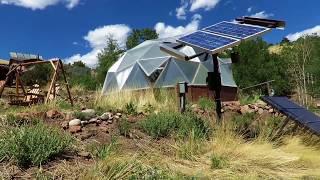 Off Grid Living With a Growing Dome Greenhouse