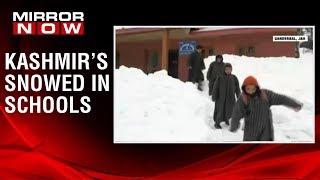 Kashmir's schools covered under 6-8 ft of snow, Children forced to study in chilly temperatures