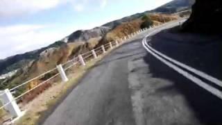 Riding the road into Queenstown, Tasmania