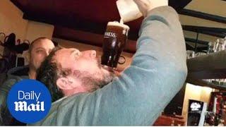 Man does amazing pub trick with a pint of Guinness - Daily Mail