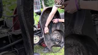 Replacing a lawn mower blade: people changing a blade on a mower