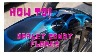 Custom painting Candy flames on modified Harley Davidson.