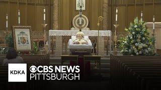 Parishioners say final goodbyes to late Bishop Lawrence Brandt