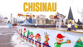 Walking in Chisinau, central park and Christmas Market carousel, snow in January 2023