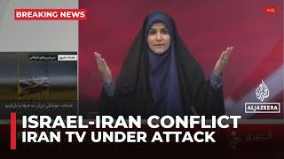 Iranian state TV attacked while on air in latest wave of Israeli strikes on Tehran