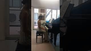 Ada playing The Little White Cloud by Jessie Blake