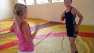 Mixed wrestling girl fights an older boy in bjj match