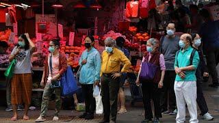 Hong Kong official: City not asking public servants to give up BNO passports