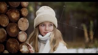 Portrait fashionable young woman girl in white hat and jacket on background log wall. Winter