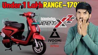 The iVOOMi Energy JeetX ZE Electric Scooter Price under 1 lakh Provides a Range of 170 km.