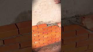 The process of installing red bricks using cement #shorts