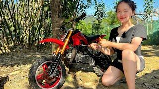 The girl repaired and maintained mini electric motorbikes for her neighbor.