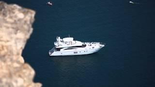 White yacht in the sea. Free HD stock footage.