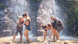 The girl and the guy went down to the stream together to catch fish for survival [ Lý Thị Ngân