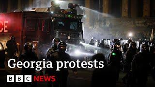 Police in Georgia use water cannon as EU protests erupt for second night | BBC News