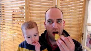 Reviewing 'Christmas Crisps' with my 1 year old nephew